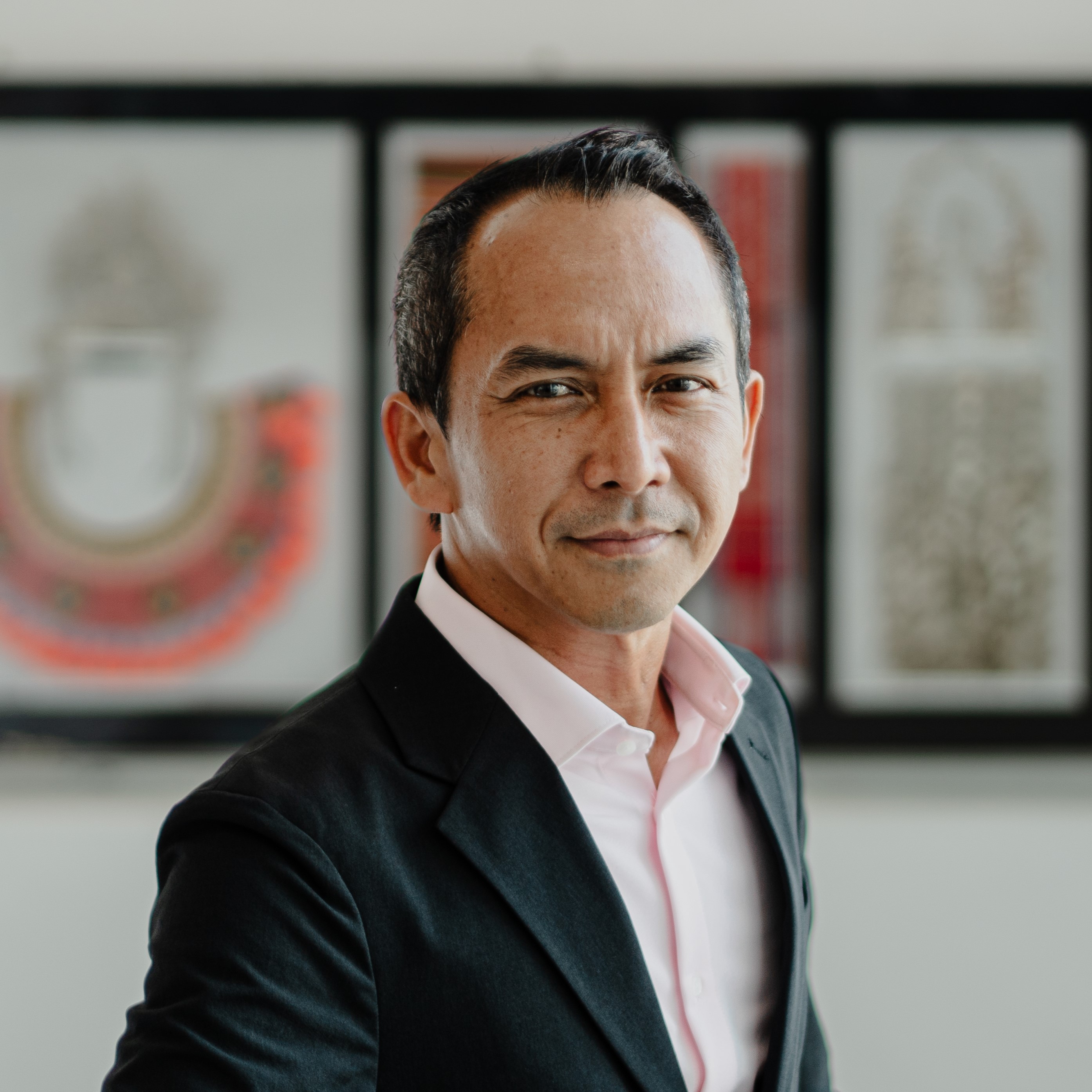Associate Professor Dr Arnold Puyok
