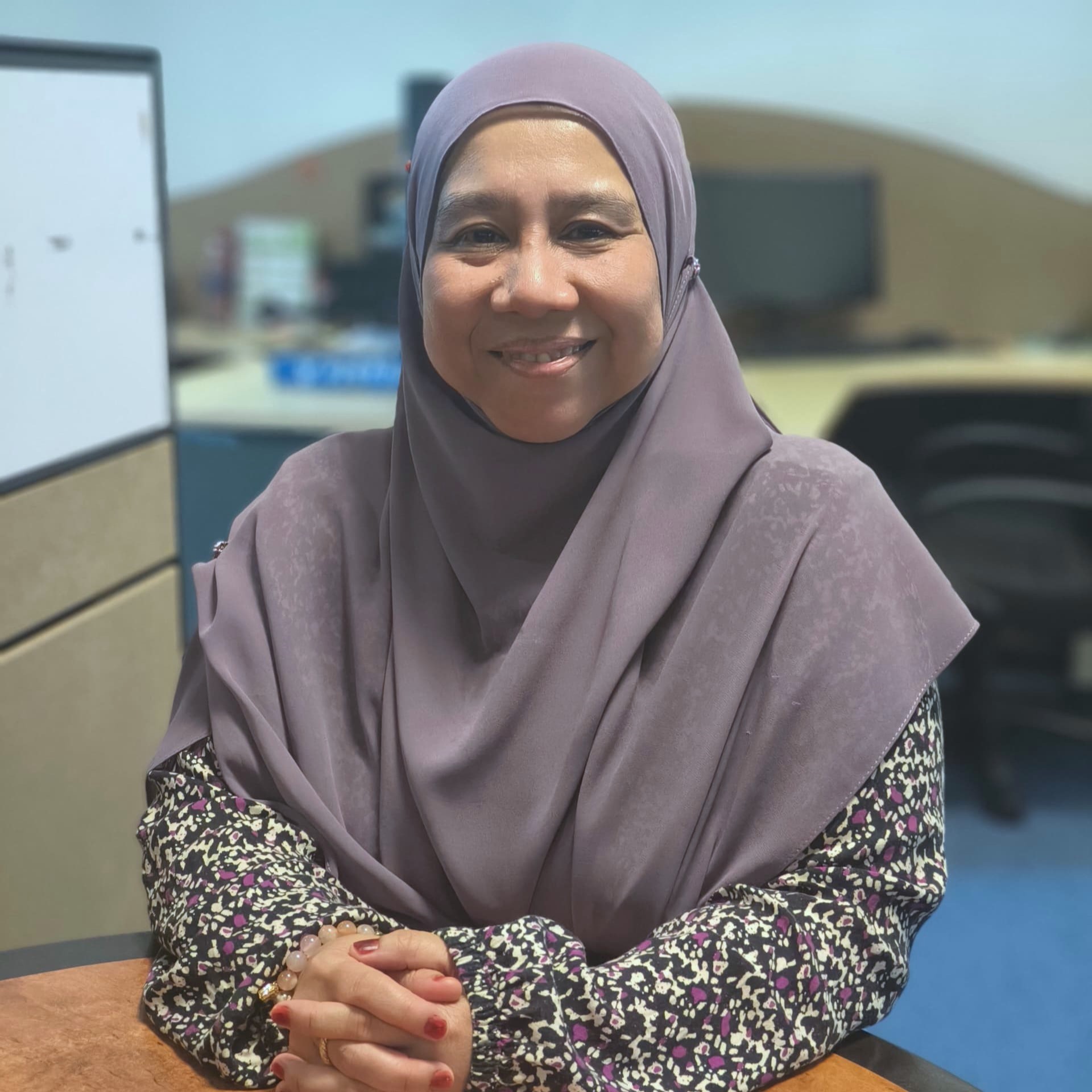 Dr Faizah Hj Mas'ud